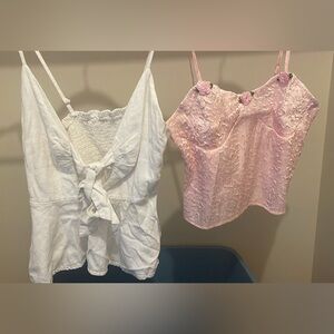 Cropped shirts, both are stretchy, no sizes on tags but fits medium
